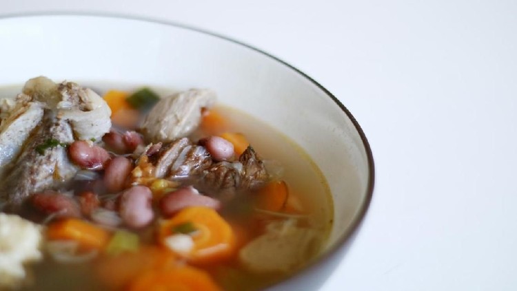 Sayur Kacang Merah Red kidney bean soup on white background. Indonesian food.