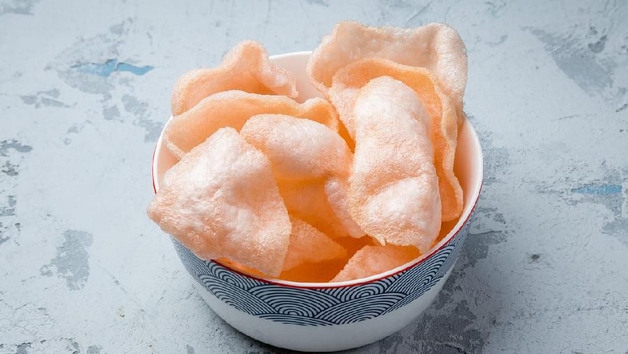 Vietnamese shrimp chips on grey concrete table