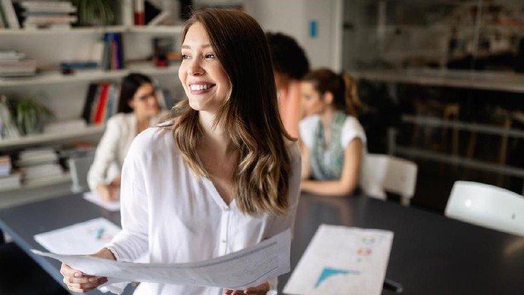 Group of young business people are working together in modern office. Creative people with laptop, tablet, smart phone, notebook. Successful hipster team in coworking. Freelancers.