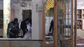 FOTO: Ratap Korban Ledakan Bom di Masjid Pakistan Ledakan bom mengguncang masjid di Quetta, Pakistan, saat jemaah menggelar salat Jumat kemarin.