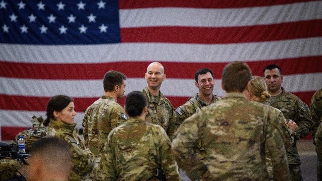 FORT BRAGG, NC - JANUARY 04: U.S. troops from the Army's 82nd Airborne Division wait at Green Ramp before they head out for a deployment to the Middle East on January 4, 2020 in Fort Bragg, North Carolina. Soldiers from the Immediate Response Force of the 82nd are part of the approximately 3,000 troops being deployed as tensions increase with Iran in the region after a U.S. airstrike killed top Iranian General Qasem Soleimani.   Andrew Craft/Getty Images/AFP