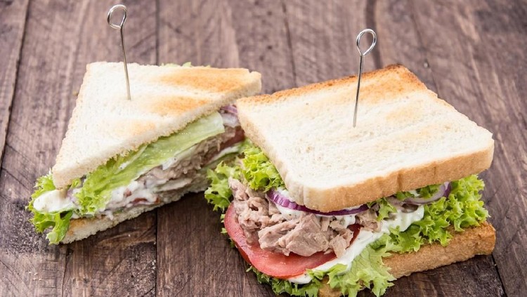 Fresh made Tuna Sandwiches on wooden background