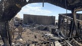 FOTO: Pangkalan AS Berantakan Usai Digempur Iran Serangan rudal Iran pada Rabu (8/1) terhadap pangkalan AS di Ain al-Asad, Irak, mengakibatkan kerusakan cukup berat.