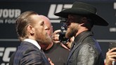 FOTO: McGregor vs Cerrone Tanpa Kata-kata Kotor Tidak ada kata-kata kotor dalam konferensi pers pertarungan UFC 246 Conor McGregor vs Donald Cerrone di Las Vegas, Amerika Serikat.