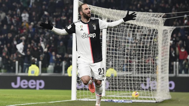Juventus' Gonzalo Higuain celebrates after scoring during the Italian Cup soccer match between Juventus and Udinese, at the Allianz Stadium in Turin, Italy, Wednesday, Jan. 15, 2020. (Fabio Ferrari/LaPress via AP)