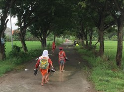 Hujan Bukan Halangan untuk Sekolah