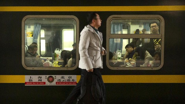 FOTO: Mudik Imlek, Migrasi Manusia Terbesar Sejagat