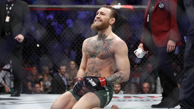 McGregor meraih kemenangan ke-22 dari 26 pertarungan sekaligus kemenangan KO ke-19 dalam karier di MMA. (AP Photo/John Locher)