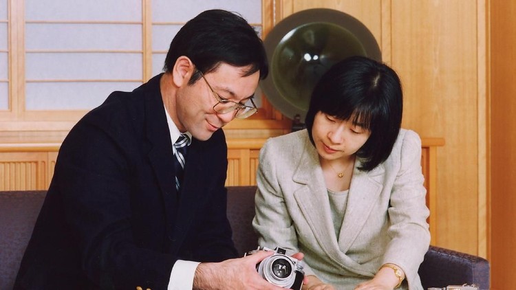 TOKYO - NOVEMBER 12: (EDITORIAL USE ONLY) In this recent Handout Photo released by the Imperial Household Agency, Japan's Princess Sayako looks at a camera belonging to her fiance Yoshiki Kuroda at the Imperial Palace November 12, 2005 in Tokyo, Japan. (Photo by The Imperial Household Agency via Getty Images)