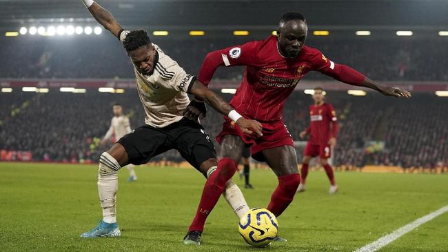 Duel penghuni papan atas klasemen Liga Inggris, Liverpool vs Manchester United bakal tersaji, Minggu (17/1) malam WIB.