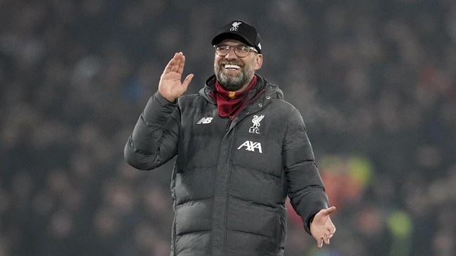 Liverpool's manager Jurgen Klopp celebrates after his team won the English Premier League soccer match between Liverpool and Manchester United at Anfield Stadium in Liverpool, Sunday, Jan. 19, 2020.(AP Photo/Jon Super)