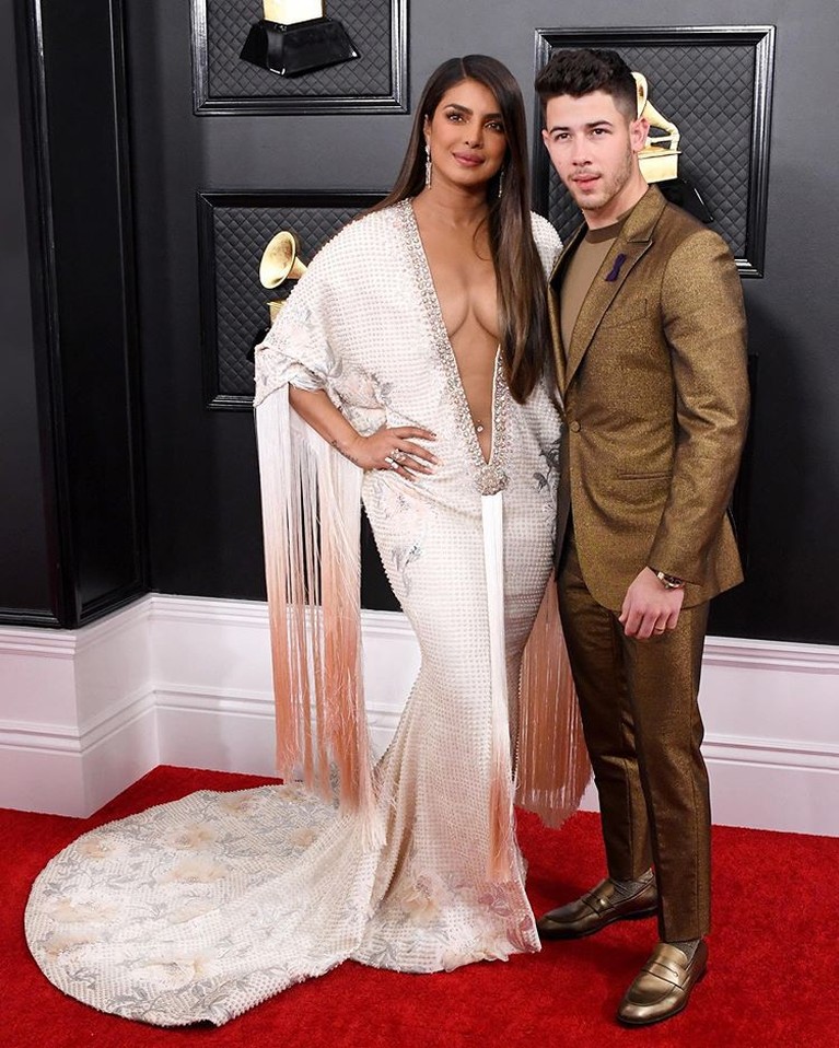 Para artis tampil menawan di Grammy Awards 2020 di Los Angeles, Minggu (26/1). Tapi beberapa dari mereka malah dinilai mengenakan pakaian yang kurang pas.