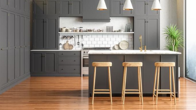 Scandinavian style kitchen with geometric backsplash and blue and white cupboards