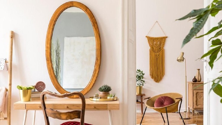 Stylish and minimalistic scandi interior of living room with design furnitures. Home decor.