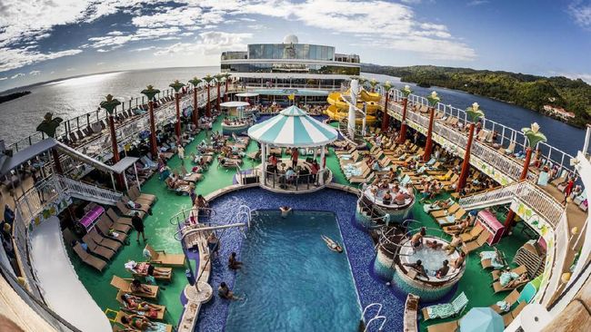St. Maarten, Netherlands Antilles - February 02, 2013: A general view of the pool deck of the Norwegian Gem while sailing  near the  St. Maarten coast at Caribbean Sea.
