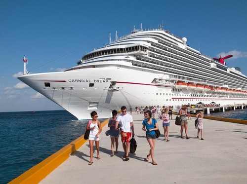 Cozumel, Mexico - March 21, 2011: Passengers disembark from the Carnival Dream during a port stop on 7-day Western Caribbean cruise