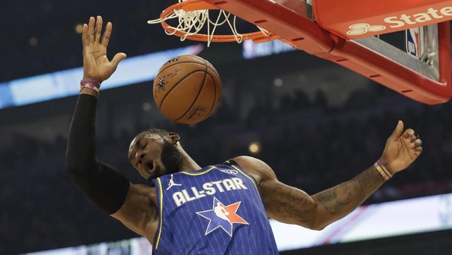 LeBron James of the Los Angeles Lakers dunks during the first half of the NBA All-Star basketball game Sunday, Feb. 16, 2020, in Chicago. (AP Photo/Nam Huh)