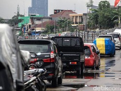 Punya Mobil Tanpa Garasi Terancam Denda Rp 2 Juta!