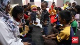 FOTO: Wajah-wajah di Bawah Atap Pengungsian Banjir Jakarta Ada belasan ribu warga (ribuan kepala keluarga) di sejumlah wilayah Jakarta yang terpaksa harus berada di posko pengungsian karena rumah mereka kebanjiran.