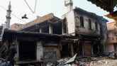 FOTO: Pasca Bentrok Umat Hindu-Muslim di India Bentrokan antara umat Hindu dan Muslim terjadi dalam dua hari pada Senin (24/2) dan Selasa (25/2) di New Delhi, India.