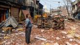 FOTO: Pasca Bentrok Umat Hindu-Muslim di India Bentrokan antara umat Hindu dan Muslim terjadi dalam dua hari pada Senin (24/2) dan Selasa (25/2) di New Delhi, India.