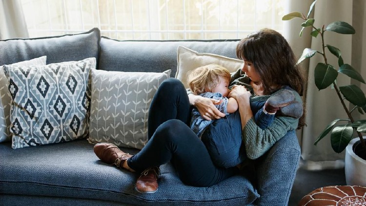 Cropped shot of a young woman spending quality time at home with her son