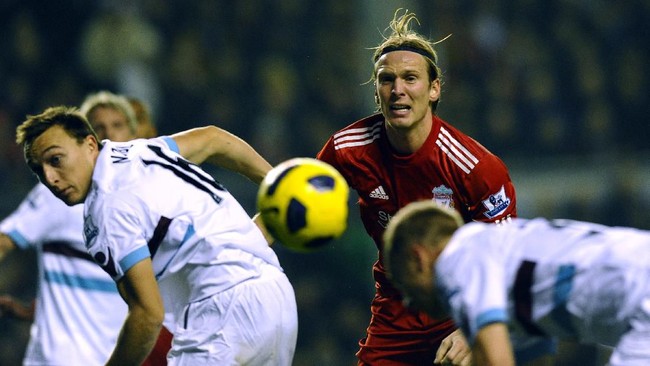 Christian Poulsen gagal bersinar saat memperkuat Juventus dan Liverpool setelah lebih dulu bersinar saat memperkuat Sevilla.