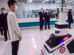 Robot hingga Helm Pintar, Kecanggihan yang Dipakai China Lawan Corona