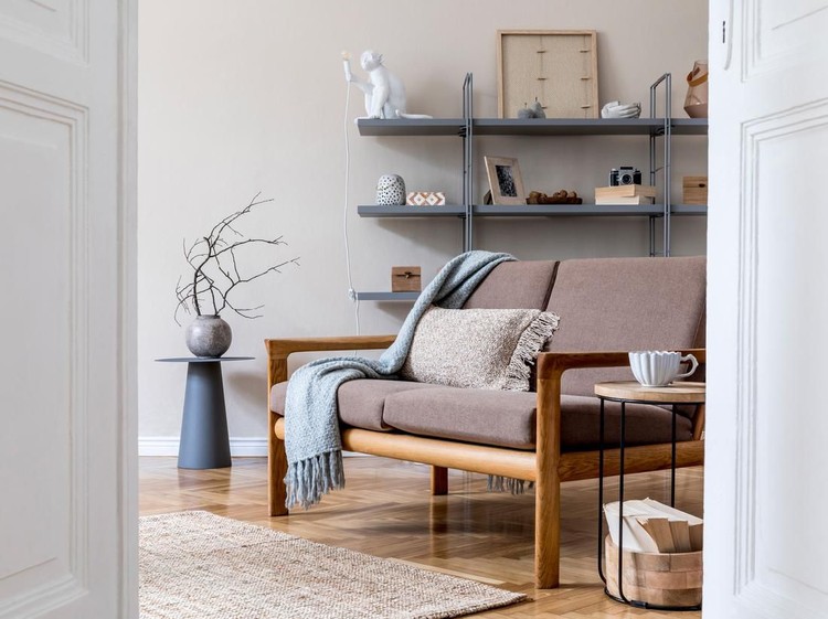 Room with cozy light decorated in Scandinavian style, using natural materials.