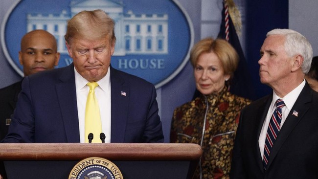 President Donald Trump speaks in the briefing room of the White House in Washington, Monday, March, 9, 2020, about the coronavirus outbreak as Dr. Robert Redfield, director of the Centers for Disease Control and Prevention, U.S. Surgeon General Jerome Adams and Vice President Mike Pence, listen. (AP Photo/Carolyn Kaster)