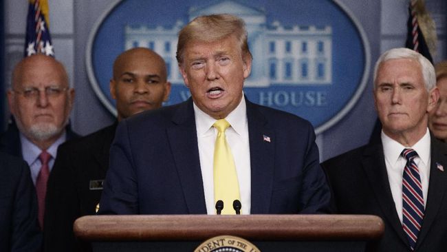President Donald Trump speaks in the briefing room of the White House in Washington, Monday, March, 9, 2020, about the coronavirus outbreak as Dr. Robert Redfield, director of the Centers for Disease Control and Prevention, U.S. Surgeon General Jerome Adams and Vice President Mike Pence, listen. (AP Photo/Carolyn Kaster)