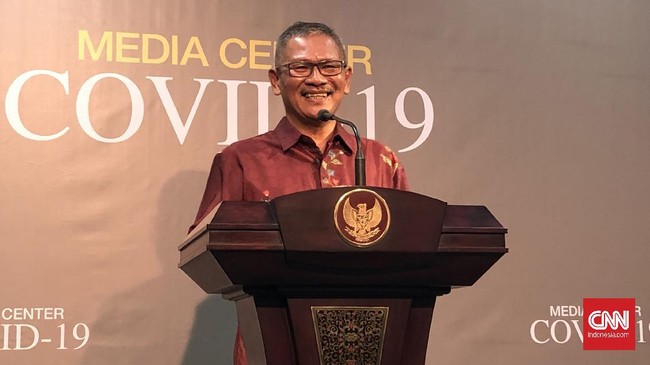Jubir corona Achmad Yurianto dan Ketua KADIN Rosan Roeslani