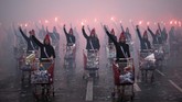NYALANG: Dibelai Warna-warni Asa dan Cita Dalam foto-foto unik pilihan CNNIndonesia.com pekan ini, ada festival holi di India, kawanan sapi di Argentina, dan sepi wisatan di Italia.