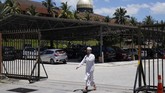 FOTO: Malaysia Tetapkan Lockdown hingga Akhir Maret Perdana Menteri Malaysia, Muhyiddin Yassin menetapkan lockdown (pembatasan wilayah) selama dua pekan terhitung mulai 18 hingga 31 Maret 2020.