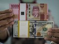 Rupiah Dibuka Menguat ke Rp16.155 per Dolar AS