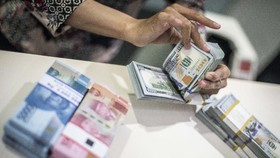 Rupiah Menguat ke Rp16.028 Berkat Neraca Dagang RI Surplus