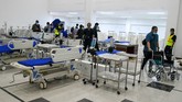 FOTO : Menyulap Wisma Atlet Jadi RS Darurat Corona Wisma Atlet Kemayoran disulap menjadi rumah sakit darurat untuk pasien Covid-19 akibat virus corona.
