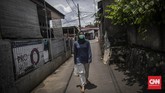 FOTO: Menjaga Sesama dari Balik Tembok Rumah Bekerja dan berdiam diri di rumah menjadi cara yang efektif bagi warga ibu kota untuk mencegah virus corona menyebar luas.