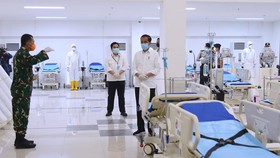 Corona, Jokowi Perintahkan Impor Bahan Baku APD Dilonggarkan