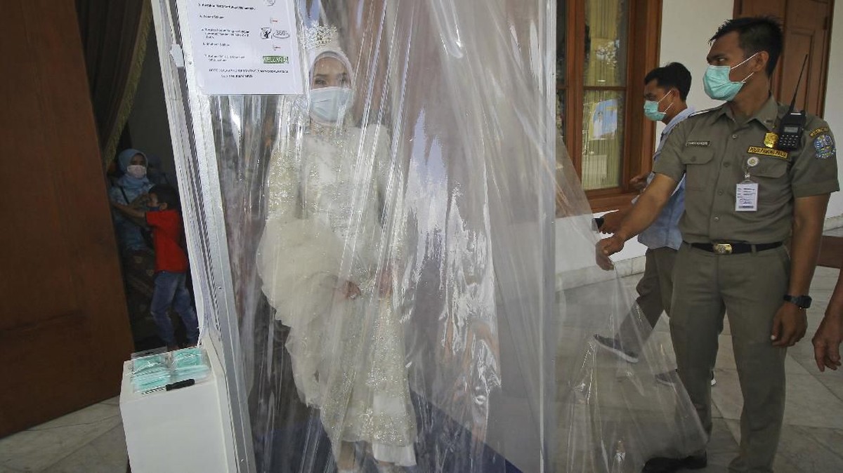 FOTO : Pernikahan di Tengah Wabah Virus Corona