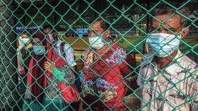FOTO: Nasib WNI Usai Lockdown Malaysia