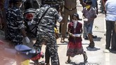 FOTO : Nestapa Perantau di Kala Lockdown di India Kaum kelas bawah di India justru semakin sengsara ketika diberlakukan penguncian wilayah (lockdown) akibat virus corona.