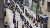 FOTO : Nestapa Perantau di Kala Lockdown di India Kaum kelas bawah di India justru semakin sengsara ketika diberlakukan penguncian wilayah (lockdown) akibat virus corona.