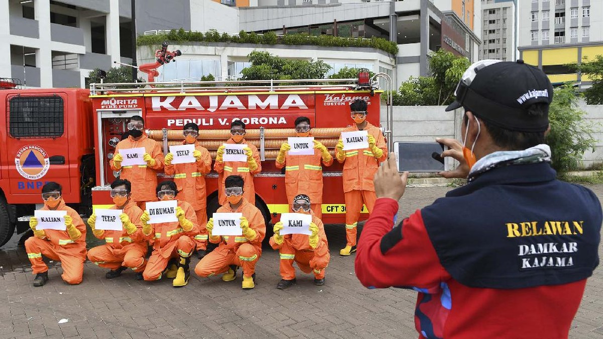 FOTO : Mereka yang Tetap Mengabdi di Tengah Pandemi
