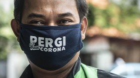 FOTO: Wajib Pakai Masker Demi Cegah Penyebaran Corona