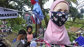 Anies Wajibkan Masker Kain 2 Lapis, Ada Denda Rp250 Ribu