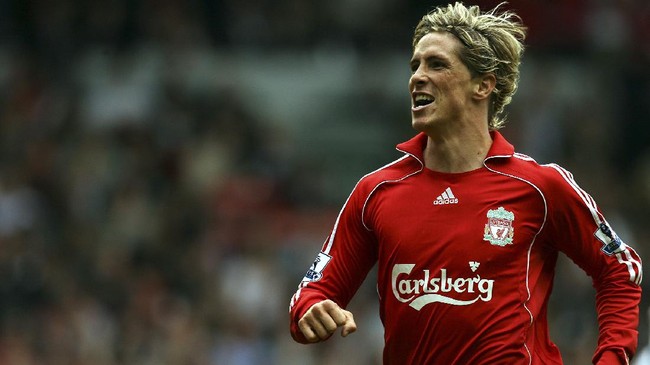 Liverpool's Fernando Torres celebrates scoring against Derby County during their English Premiership football match at Anfield, Liverpool, north-west England, 01 September 2007. Liverpool won 6-0. AFP PHOTO/PAUL ELLIS 
Mobile and website use of domestic English football pictures are subject to obtaining a Photographic End User Licence from Football DataCo Ltd Tel : +44 (0) 207 864 9121 or e-mail accreditations@football-dataco.com - applies to Premier and Football League matches (Photo by PAUL ELLIS / AFP)