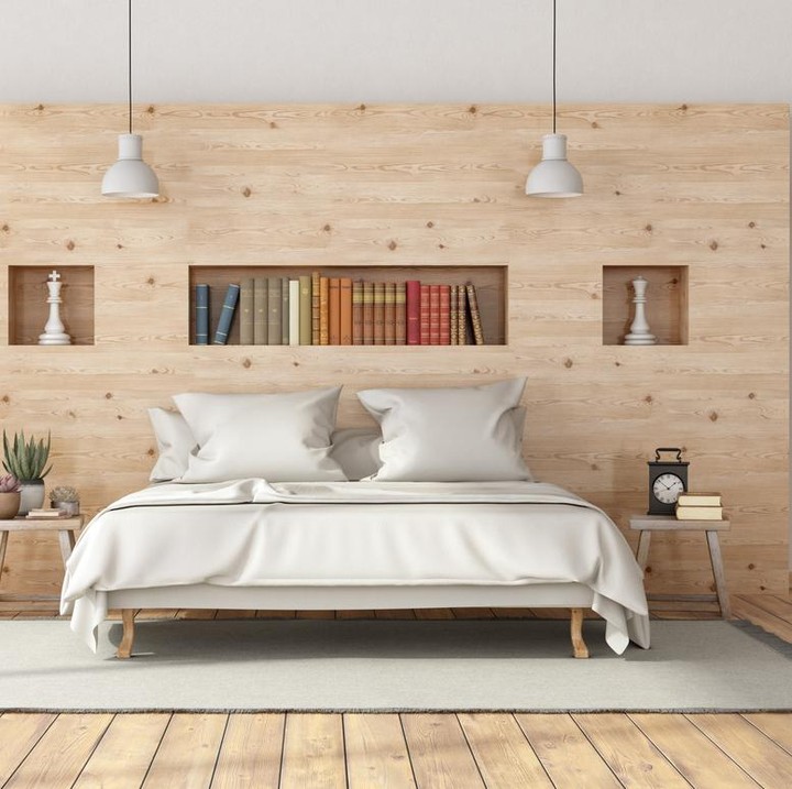 <p>Bunda juga bisa memasang kayu di tengah-tengah dinding seperti ini sebagai pengganti sandaran tempat tidur. Kayu ini dapat berfungsi seperti lemari buffet yang cocok sebagai tempat penyimpanan. (Foto: iStock)</p>
