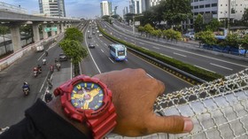 FOTO: Sejenak Melambatkan Denyut Jakarta