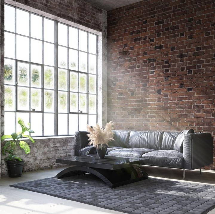 Rumah minimalis dengan gaya industrial sedang menjadi tren hunian favorit, Bun. Gaya ini bisa diterapkan di ruang tamu lho. (Foto: iStock)